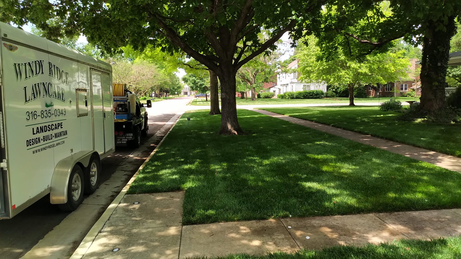 Windy Ridge Lawn Care truck on the job
